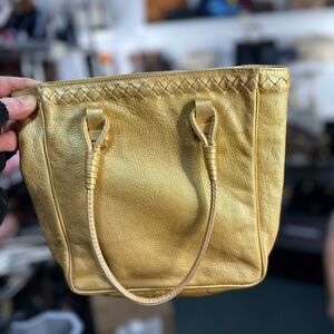 $3100 BOTTEGA VENETA GOLD HANDBAG